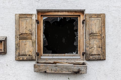 Window of a farmhouse destroyed by hail, storm on 26.8.23 near Benediktbeuern, Bavaria, Germany,