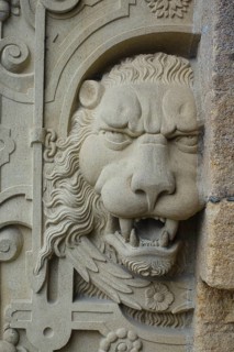 Lion's head at the gate portal, lower castle gate, stone figure, restored sculpture, relief,