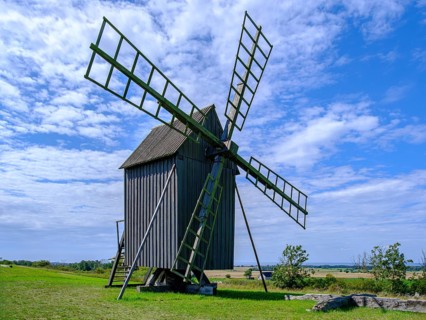 Three traditional historic windmills (Resmo väderkvarnar) in the village of Resmo on Öland, Kalmar