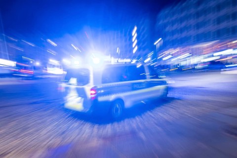 A police vehicle in action, with blue light switched on, Dresden, Saxony, Germany, Europe