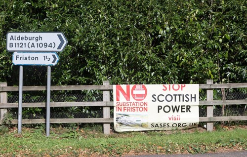 Roadside protest banner against Scottish Power plant for electricity substation at Friston,