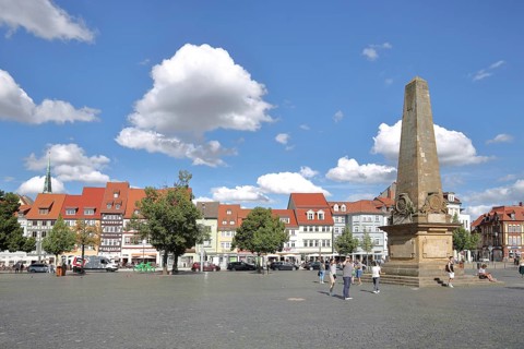 Cathedral square with Erthal obelisk built in 1777, monument with column, people, houses, cathedral