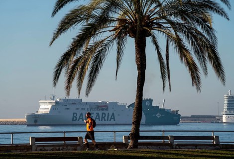 Waterfront promenade, ferries and cruise ship in the bay of Palma de Majorca, Spain, Europe
