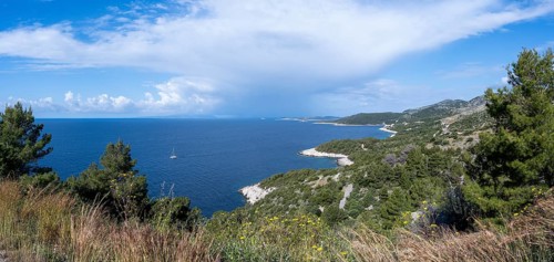 Catamaran sailing along the coast, island of Hvar, Dalmatia, Croatia, Europe