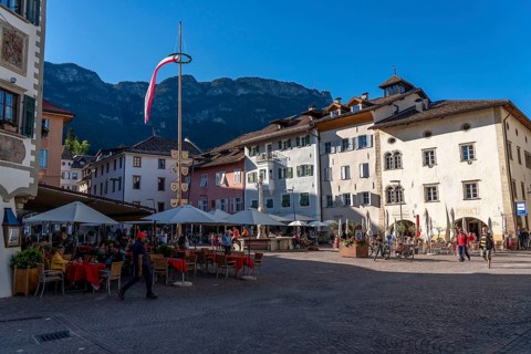 The village of Kaltern, on the South Tyrolean Wine Road, market square, South Tyrolean flag, Italy,