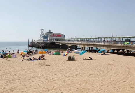 The pier and sandy beach at Bournemouth, Dorset, England, UK