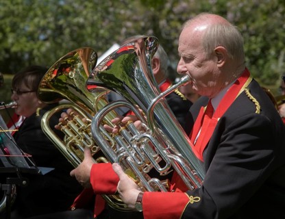 Musicians in a brass band perform during a country fair at Helmingham Hall, Suffolk, England,