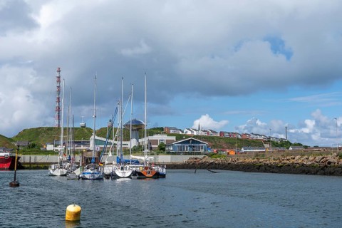 View from south-east to harbour facilities, Unterland and Oberland, offshore island Helgoland, blue