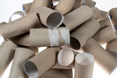 Pile, mountain of empty, used toilet paper rolls