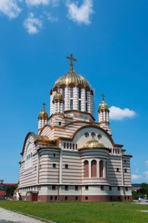 A church with golden domes and a Christian cross under a blue sky, Orthodox Cathedral of St John