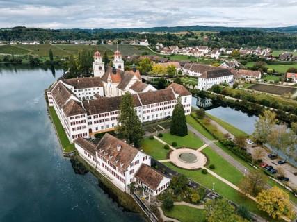 Aerial view of the former Benedictine abbey with the monastery church of St Mary on the Rhine