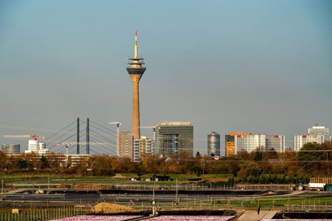 Skyline of Düsseldorf city centre, Rhine Tower, city gate building, Rhine knee bridge, North