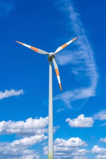 Wind turbine, wind energy plant from the manufacturer Enercon, blue sky with many white clouds,