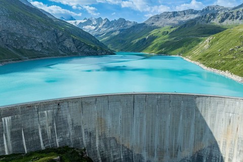 Dam of the Moiry lake, Lac de Moiry, turquoise glacial water, aerial view, Valais, Switzerland,