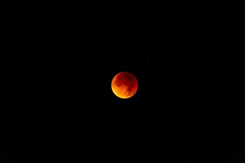 The moon with starry sky, blood moon, taken in the Swiss mountains, Switzerland, Europe