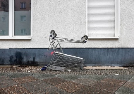 Shopping trolley on a pavement, illegal waste disposal in the Berlin district of Wedding, 15.02