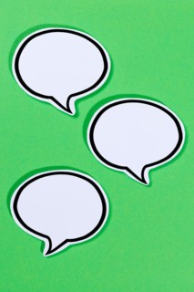 Speech bubbles with text free space Copyspace as communication Information concept talk