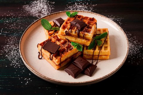 Viennese waffles, with chocolate, breakfast, on a dark background, no people, selective focus,