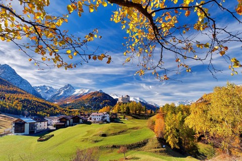 Village view of Tarasp with castle in autumn, Scuol, Canton Graubünden, Switzerland, Europe