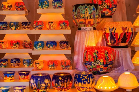 Colourful tea lights in a stall at the Christmas market at City Hall, Vienna, Austria, Europe