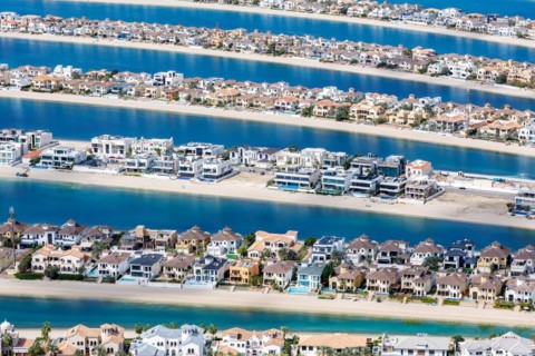 Artificial island in the shape of a palm tree The Palm Jumeirah with luxury villas properties in