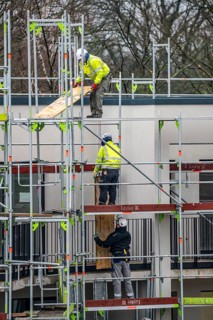 Construction site, scaffolding, dismantling of scaffolding on a residential building, Germany,