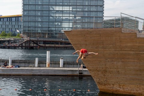 Summer, swimming in the harbour of Copenhagen, there are official bathing places, harbour baths and