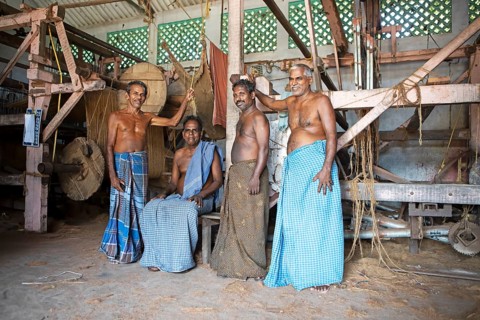 Indian worker in the weaving mill of the Labourers Coir Mats and Mattings Cooperation, coir mat