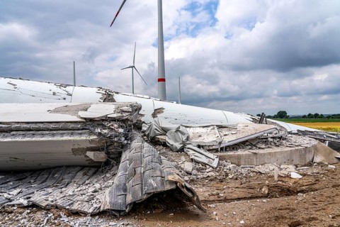 Demolished tower of a 20 year old wind turbine, in the Werl wind farm, 5 old Enercon E-66 turbines