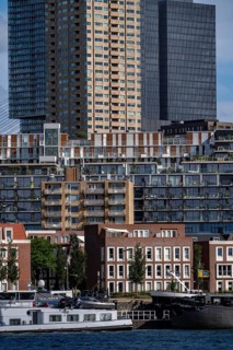 Harbour basin of the Maashaven, inland waterway port, jetties, residential buildings in the Kop van