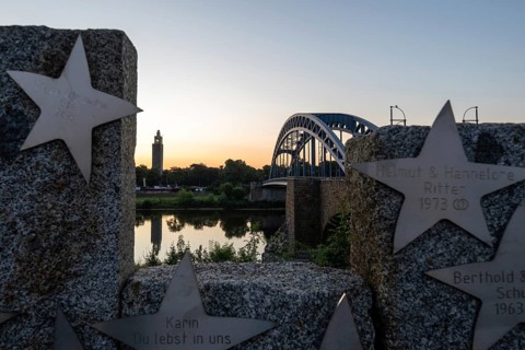 View of the Sternbrücke and the Albin Müller Tower shortly in front of sunrise, Magdeburg,