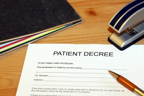 Symbolic image: Healthcare proxy, living will in English on a desk