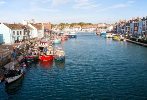 Colourful fishing boats in the harbour at Weymouth, Dorset, England, United Kingdom, Europe