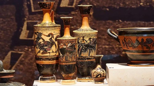 Greek ceramic vases with ornamental patterns in a museum, Archaeological Museum, Archea Korinthos,