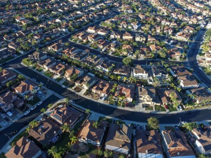 Aerial view of populated neigborhood of houses