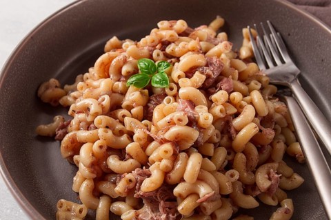 Pasta with stewed meat, pasta in the navy, horns, homemade, no people