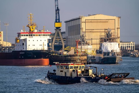 Port of Hamburg, Blohm + Voss shipyard, dredger OSTERIFF and corvette of the German Navy,