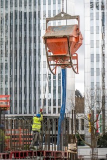Concrete works, concrete bomb, on a large construction site, construction of a residential and