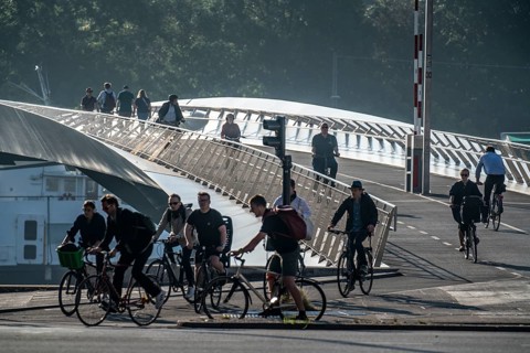 Cyclists on the Lille Langebro cycle and pedestrian bridge over the harbour, Copenhagen is