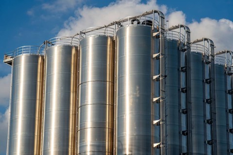 Stainless steel tanks of a large silo facility in Duisburg inland harbour, Duisburg-Neuenkamp, for