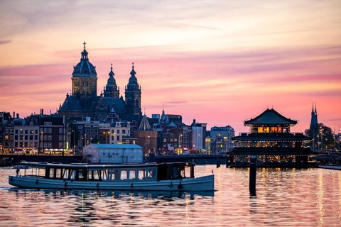 Amsterdam, Netherlands, city centre, St. Nicholas Basilica, restaurant boat, canal cruise