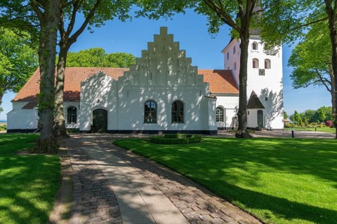 Bogense on the Kattegat, St Nicolas Church, Danish architecture, stepped gables, group of trees,