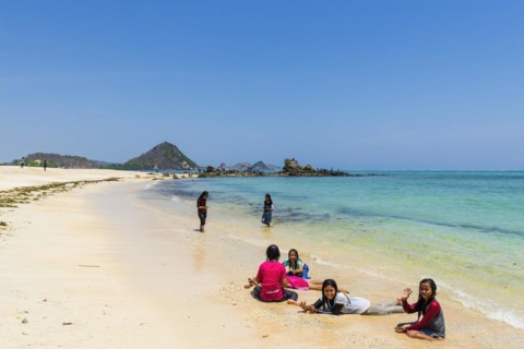 Girl at Mandalika beach in Kuta, beach, tourism, travel, holiday, beach holiday, beach holiday,