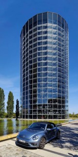 A VW car with car tower for the delivery of new cars on the grounds of the Autostadt, Volkswagen
