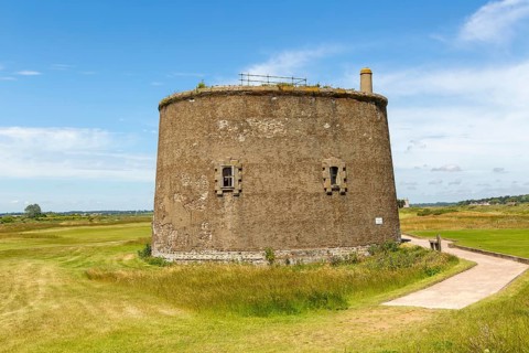 Martello Tower T 1810-1812, Napoleonic War military building on golf course, Felixstowe Ferry,