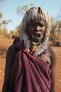 South Ethiopia, in Maco National Park, Mursi tribe, young Mursi woman, plate-lipped woman, woman