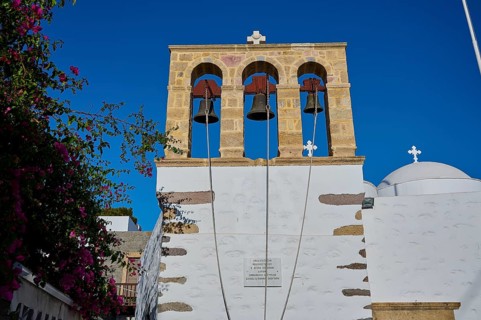 Agios Ioannis Prodromos Church, Historic church with three bell arches, surrounded by white walls