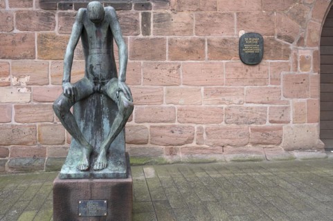 Bronze sculpture of Job, created by the German sculptor Gerhard Marcks in 1957, in front of St