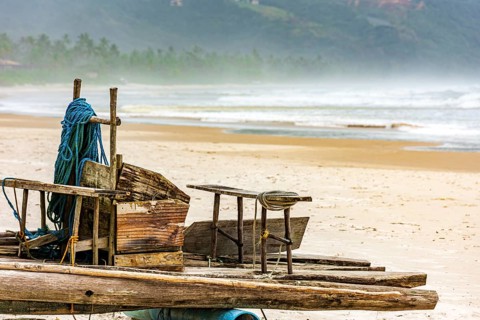 Primitive fishing boat used in northeastern Brazil called Jangada made with wooden trunks, Serra