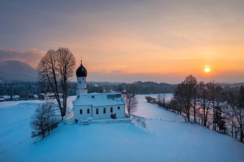 Sunset, Church of the Visitation of the Virgin Mary in winter, Oberbuchen, drone shot, Tölzer Land,